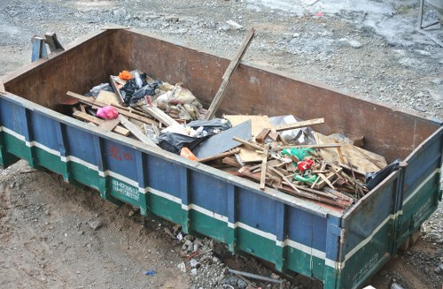 Construction site with waste materials being cleared in Crystal Palace