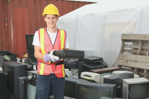 Recycling bins and separated waste streams in a commercial yard